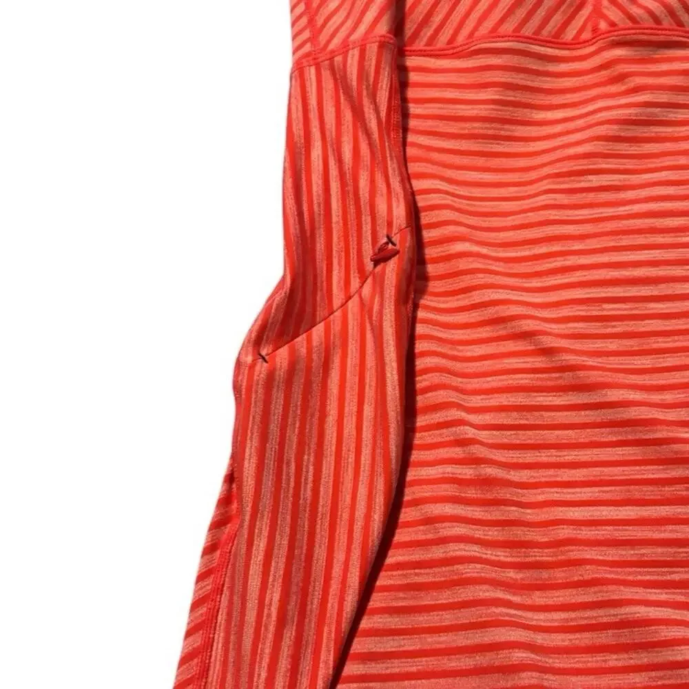 Title nine vibrant coral